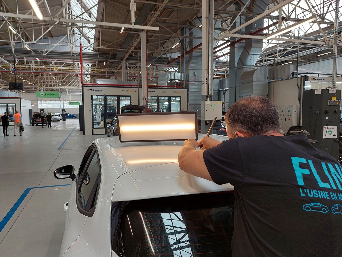 Flins (Yvelines), le 20 juillet 2022. Créée en septembre 2021, la Factory VO a pour objectif de prolonger la durée de vie des véhicules. LP/Virginie Wéber